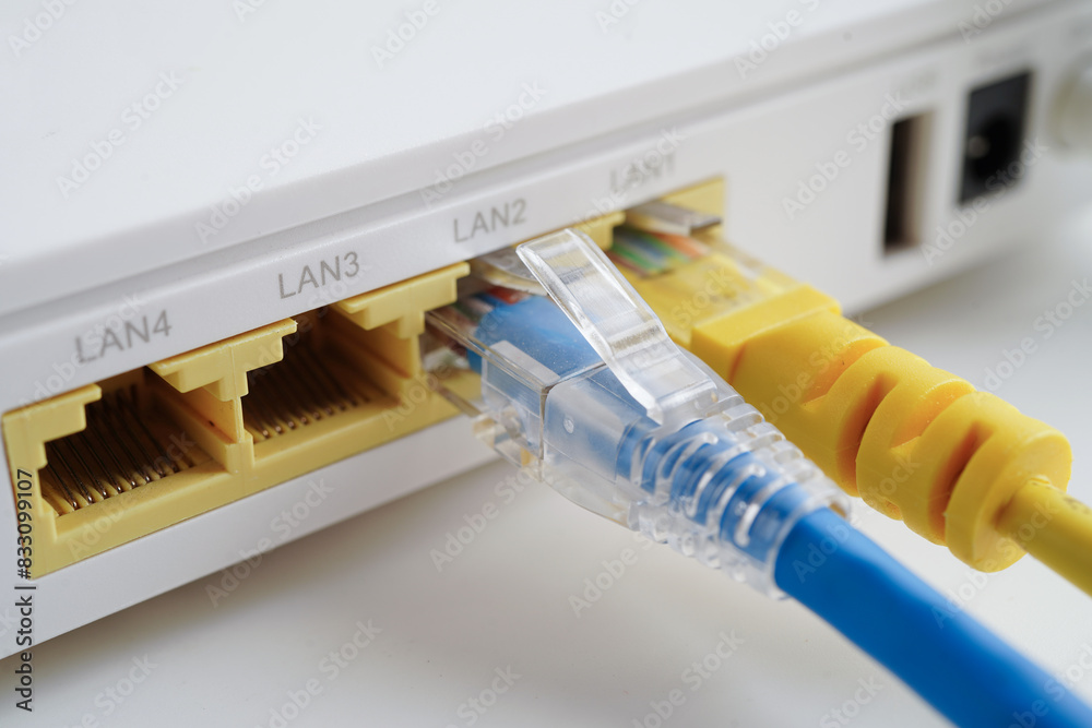 Ethernet cable with wireless router connect to internet service provider network. Ethernet cable with wireless router connect to internet service provider network.