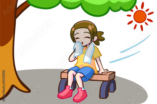 日陰で休む茶髪の女の子