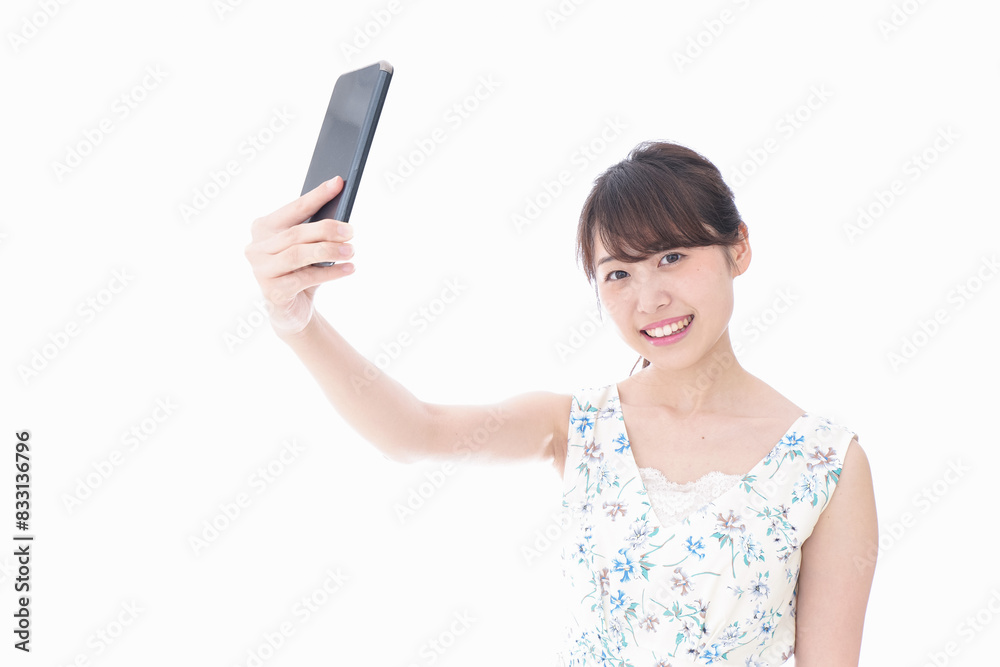 自撮り・ライブ配信をする若い女性 自撮り・ライブ配信をする若い女性