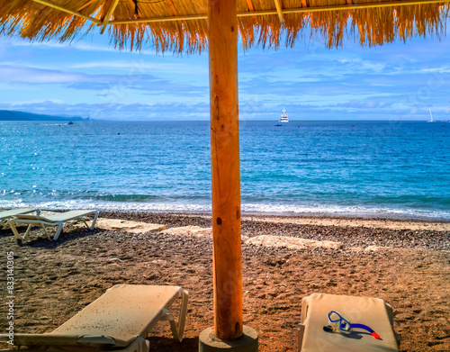 Morning on sandy beach of the Red Sea in Eilat - famous tourist resort and re...