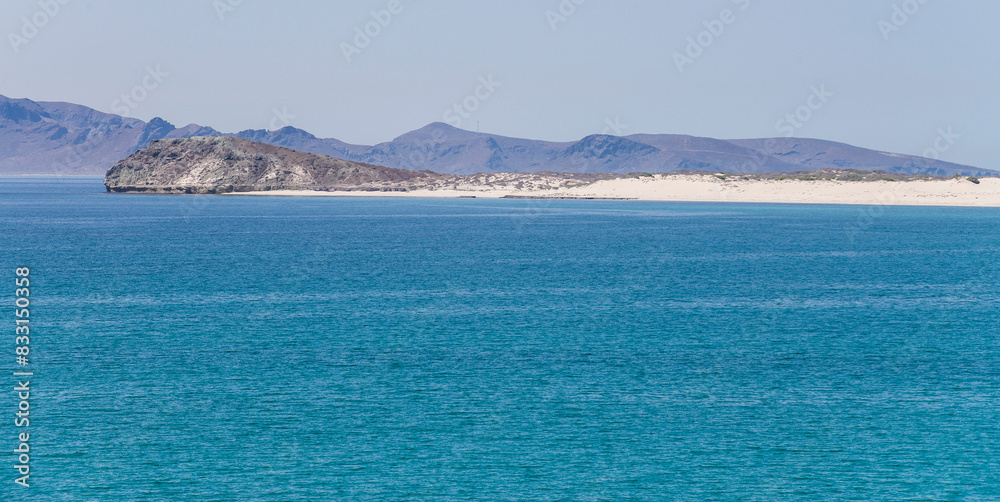 Panoramic view of Playa Bonanza or Bonanza beach on Espiritu Santo Island in Baja California Sur, in the Sea of Cortes of Mexico. Panoramic view of Playa Bonanza or Bonanza beach on Espiritu Santo Island in Baja California Sur, in the Sea of Cortes of Mexico.