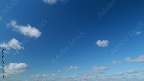 Beautiful white stratocumulus cloud. Slowly move of white cloudscape. Timelapse. © artifex.orlova