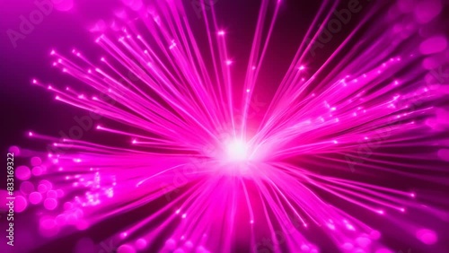 Vibrant pink fiber optic lights radiating from a central point, creating an abstract, futuristic feel. The glowing strands spread outwards, evoking a sense of energy and connectivity.
