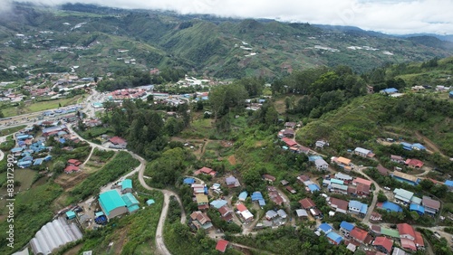 Kundasang, Malaysia - May 28 2024: Aerial View of The Kundasang Town photo