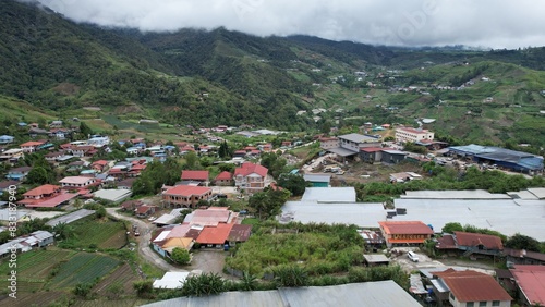 Kundasang, Malaysia - May 28 2024: Aerial View of The Kundasang Town photo