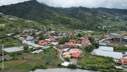 Kundasang, Malaysia - May 28 2024: Aerial View of The Kundasang Town photo