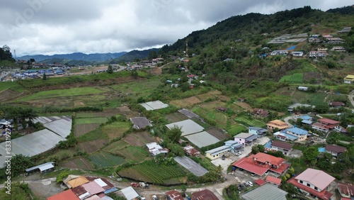 Kundasang, Malaysia - May 28 2024: Aerial View of The Kundasang Town photo