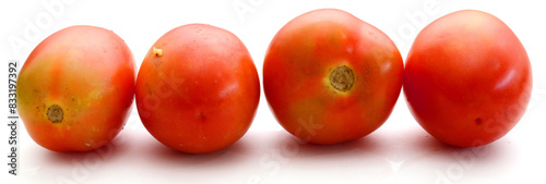 Photography Fresh red ripe tomatoes against white background - stock photo