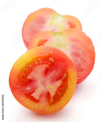 Canvas Print Fresh red ripe tomatoes against white background - stock photo