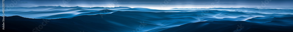 Misty Mountain Range with Gradient Blue Tones Misty Mountain Range with Gradient Blue Tones