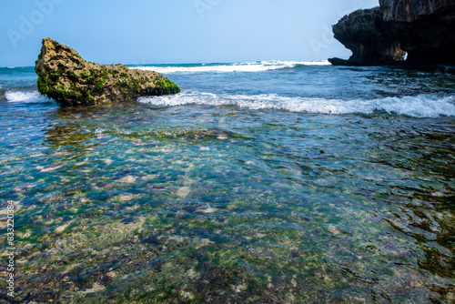 Sea waves on coral rocks.