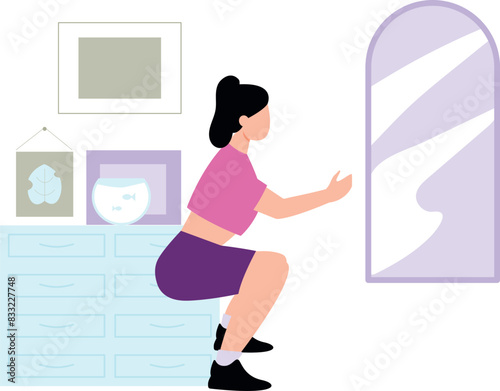 The girl is doing squat exercise in home.