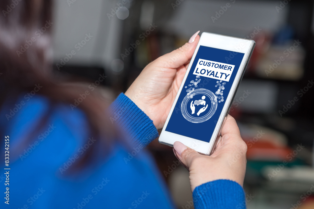 Customer loyalty concept on a smartphone Customer loyalty concept on a smartphone