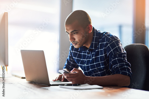 Employee, man and laptop in office for internet search, information and creativity. Reading, website and online research with project ideas, plan and strategy as graphic designer and serious