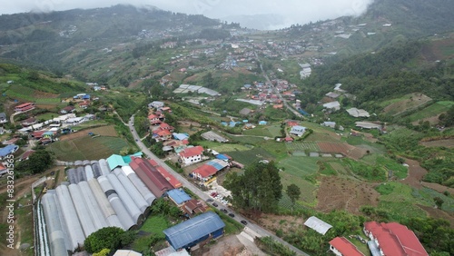 Kundasang, Malaysia - May 28 2024: Aerial View of The Kundasang Town photo