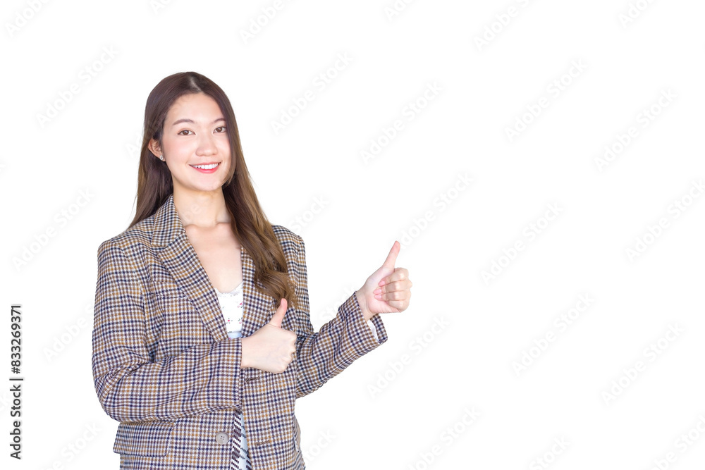 Asian professional woman with black long hair wearing plaid suit and pretty smiling looking at camera while present product thumbs up means good while isolated white background.