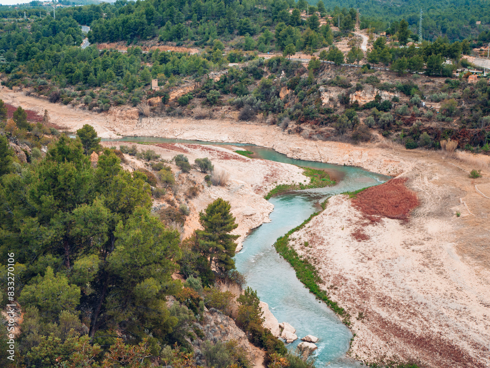 landscape of a river flowing in a hilly area on a cloudy day, aerial view landscape of a river flowing in a hilly area on a cloudy day, aerial view