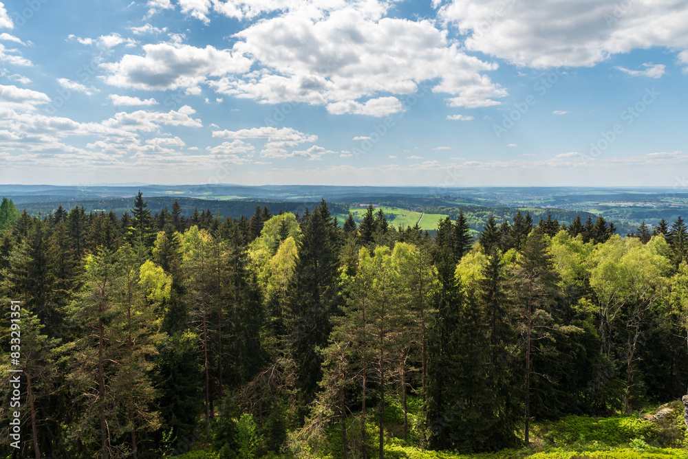 View from Vysoky kamen hill in westernmost part of Krusne hory mountains on czech - german borderland View from Vysoky kamen hill in westernmost part of Krusne hory mountains on czech - german borderland