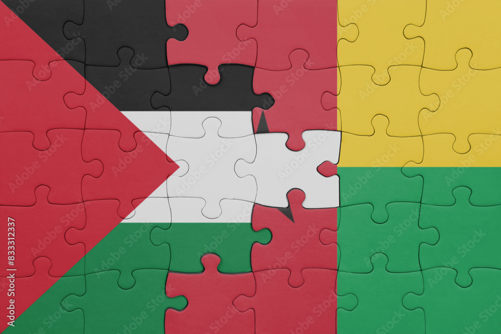 puzzle with the colourful national flag of guinea bissau and flag of palestine. puzzle with the colourful national flag of guinea bissau and flag of palestine.