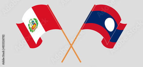 Crossed and waving flags of Peru and Laos