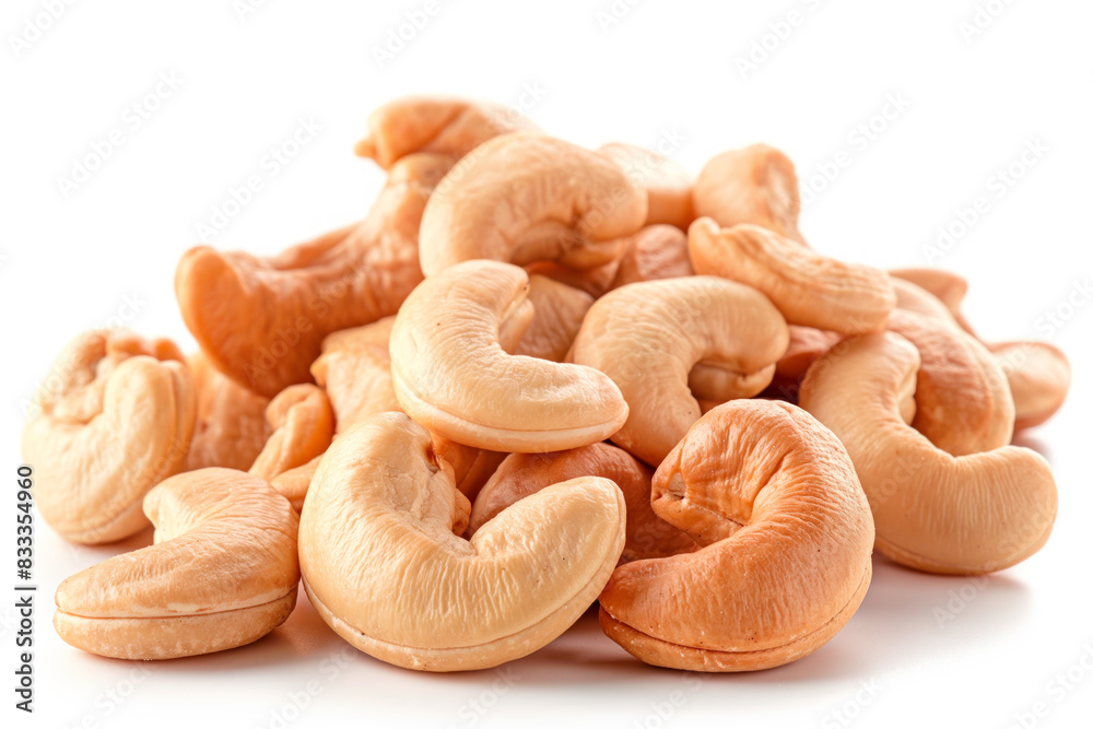 Close-up of shelled and unshelled Cashew nuts isolated on a white background, showcasing their texture Close-up of shelled and unshelled Cashew nuts isolated on a white background, showcasing their texture