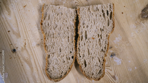 Close-Up of Sliced Artisan Whole Wheat Bread on Wooden Board