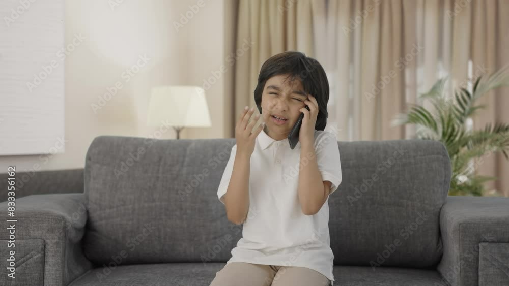 Angry Indian boy shouting on phone Angry Indian boy shouting on phone