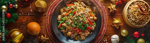 Filipino pancit canton with stirfried egg noodles, vegetables, and pork, served on a festive table with traditional Filipino decorations photo