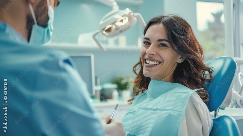 A doctor using medical expertise to address the needs of a smiling patient in a well-maintained clinic environment A doctor using medical expertise to address the needs of a smiling patient in a well-maintained clinic environment