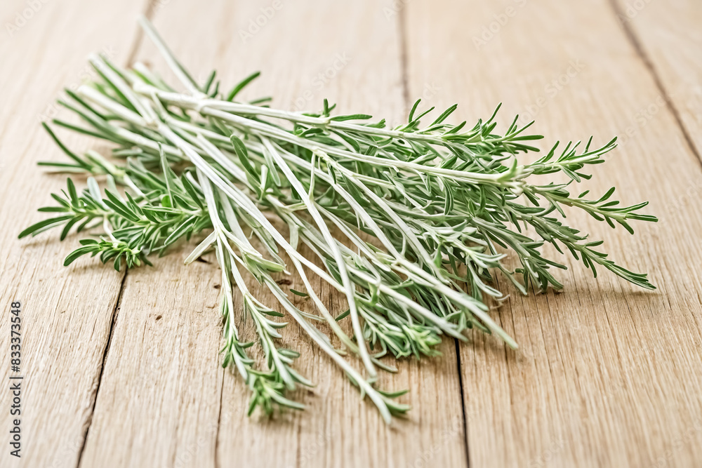Fresh Rosemary Sprigs on Wooden Surface Fresh Rosemary Sprigs on Wooden Surface