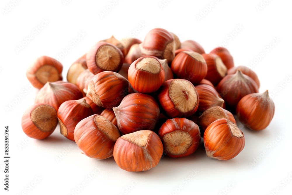 Close-up of shelled and unshelled Hazelnut nuts isolated on a white background, showcasing their texture Close-up of shelled and unshelled Hazelnut nuts isolated on a white background, showcasing their texture