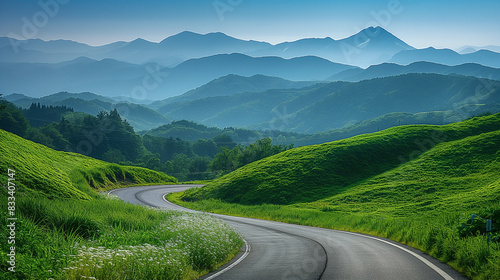 A stunning photograph of a winding road in Hokkaido, Japan. The road snakes through a picturesque landscape,  photo