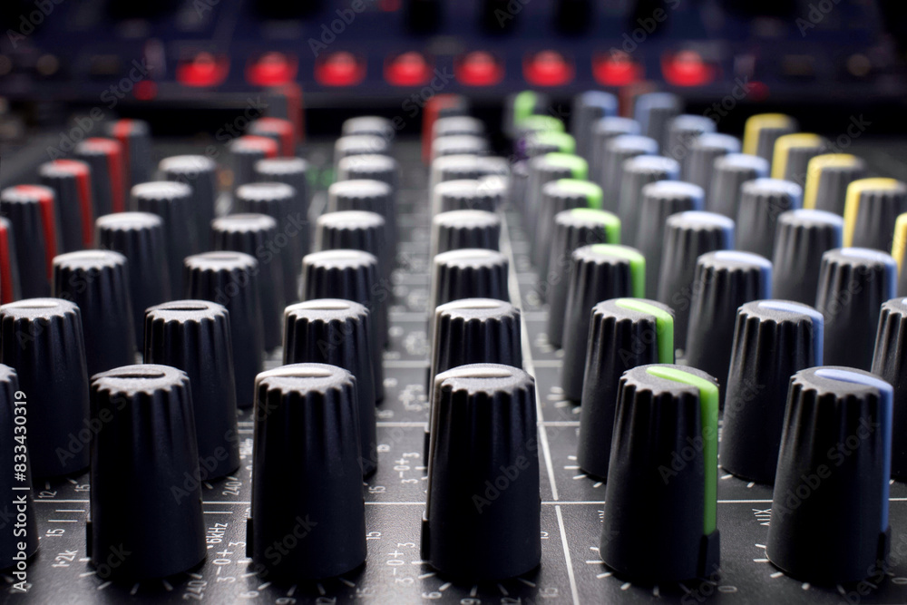 Fototapeta premium Professional audio mixing console or sound mixer in music production recording studio.
