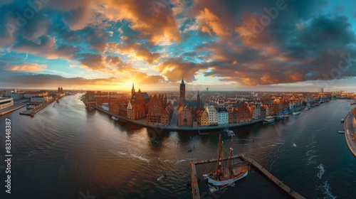 Gdansk, Poland,Europe. Beautiful panoramic aerial photo from drone to old city Gdansk, Motlawa river and Gothic St Mary church, city hall tower, the oldest medieval port crane (Zuraw) and old houses  photo