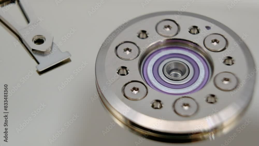 Disassembled hard drive from the computer, hdd with mirror effect. Opened hard drive from the computer hdd with mirror effects. Part of computer pc, laptop Disassembled hard drive from the computer, hdd with mirror effect. Opened hard drive from the computer hdd with mirror effects. Part of computer pc, laptop