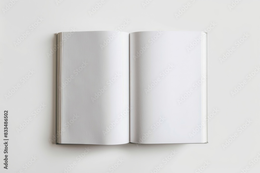 A mockup of an open blank book with white pages, on a plain background, viewed from above. The cover is visible at the top and bottom, emphasizing its texture against the light colored surface. A mockup of an open blank book with white pages, on a plain background, viewed from above. The cover is visible at the top and bottom, emphasizing its texture against the light colored surface.