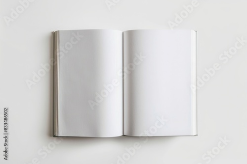 A mockup of an open blank book with white pages, on a plain background, viewed from above. The cover is visible at the top and bottom, emphasizing its texture against the light colored surface.