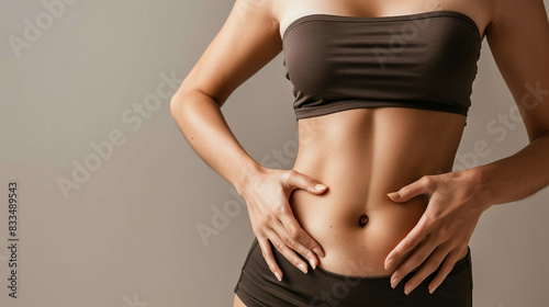 Fat Woman Touching Stomach In Studio With Liposuction Mockup, Weight Loss Concept For Health And Fitness Advertising photo