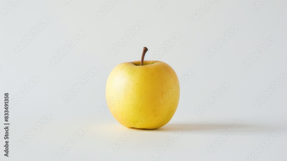 A yellow apple with a smooth, unblemished skin, standing alone on a white background, highlighting its simplicity and natural beauty A yellow apple with a smooth, unblemished skin, standing alone on a white background, highlighting its simplicity and natural beauty