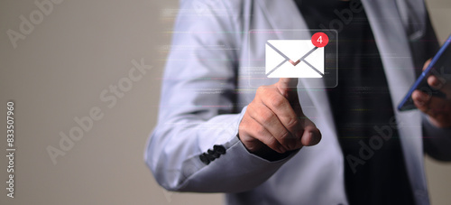 Man receives mailbox, looks at pending email communication New message on mobile smartphone