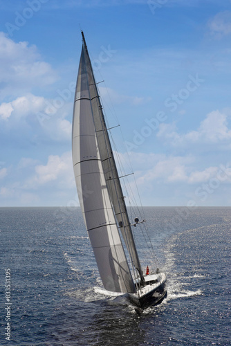 Obraz na płótnie Sailing yacht at Mediterranean Sea. Sail. Boat. Helicopter view. Aerial. Palma de Mallorca. Super sailing yacht. Full sail. w salonie
