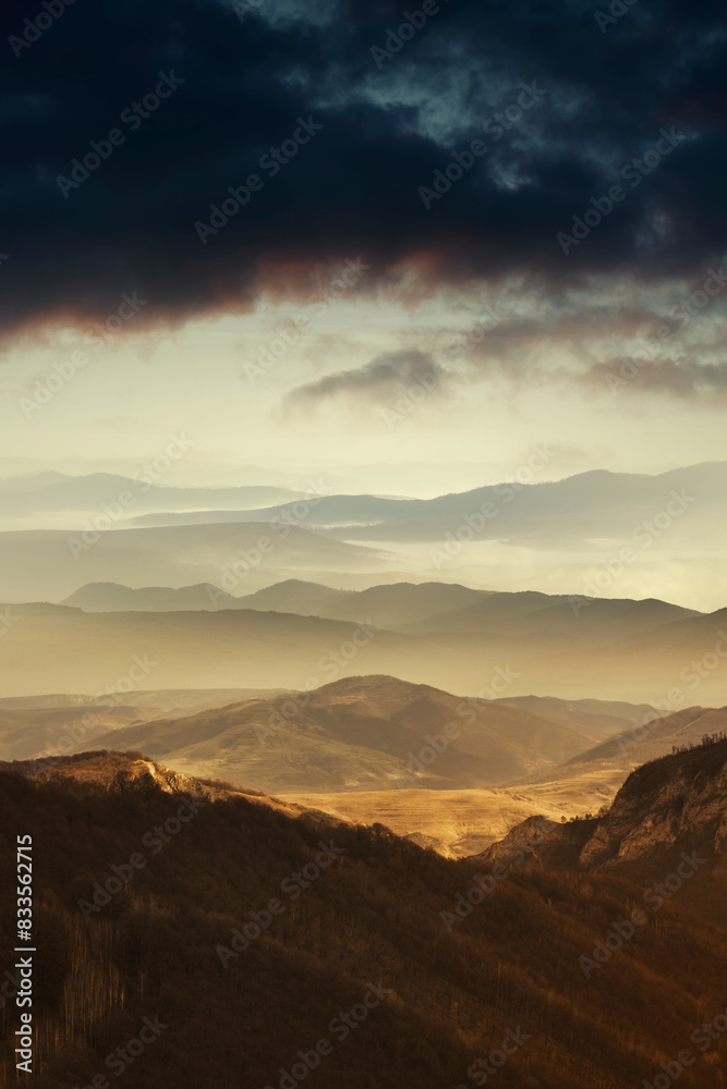 sunset light over the mountains, dramatic landscape