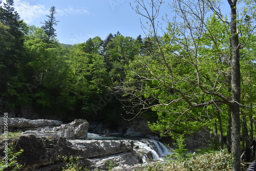 The beautiful waterfall among huge rocks in Furano city Hokkaido Japan