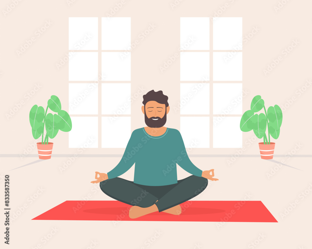 Smiling young man practicing lotus asana at home Padmasana pose Smiling young man practicing lotus asana at home Padmasana pose