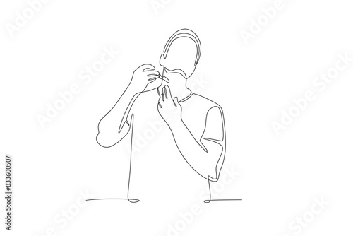 Man shaving his beard in the morning. Getting ready in the morning concept one-line drawing