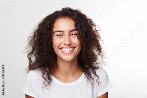young woman bright smile Filled with happiness and cheerfulness on a white background photo