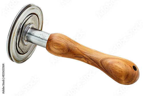 Close-up of a wood and stainless steel tool with a round metal blade on transparent background
