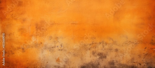 Orange grungy wall background with a textured stucco surface Image with copy space