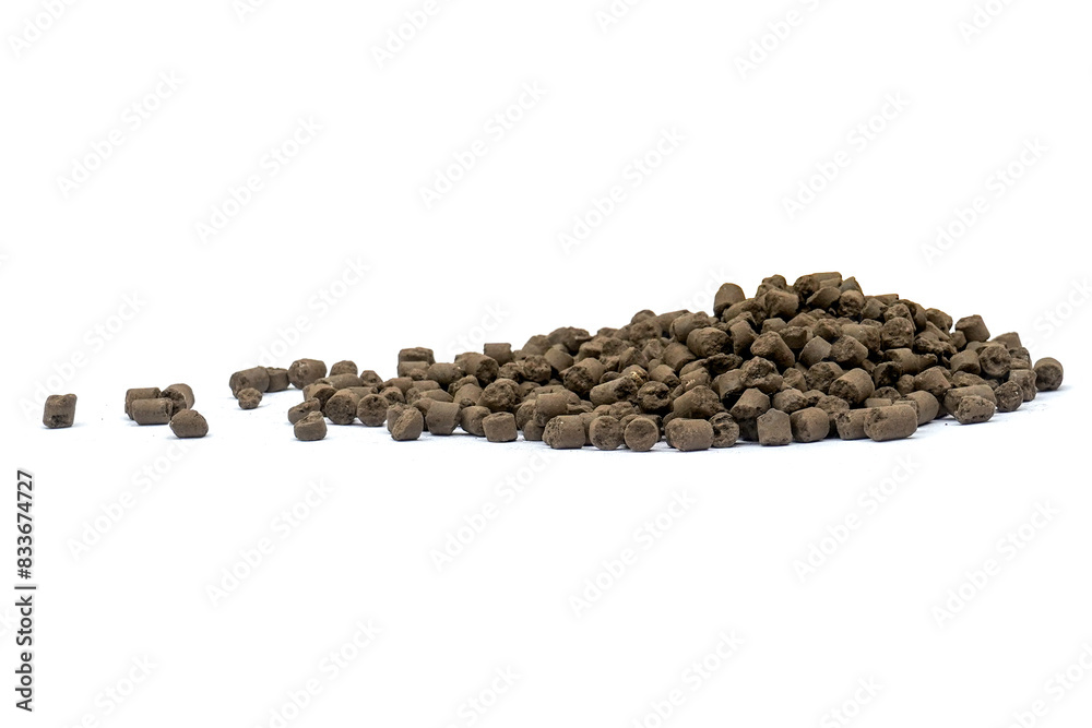Organic-chemical fertilizer pellets on a white background Organic-chemical fertilizer pellets on a white background