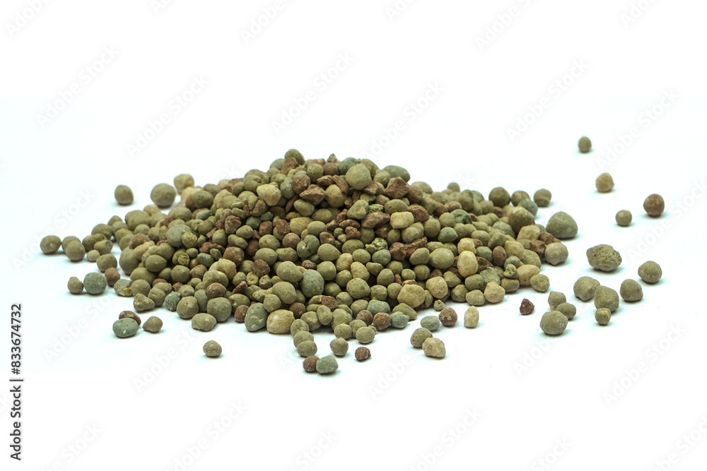 Organic-chemical fertilizer pellets on a white background Organic-chemical fertilizer pellets on a white background